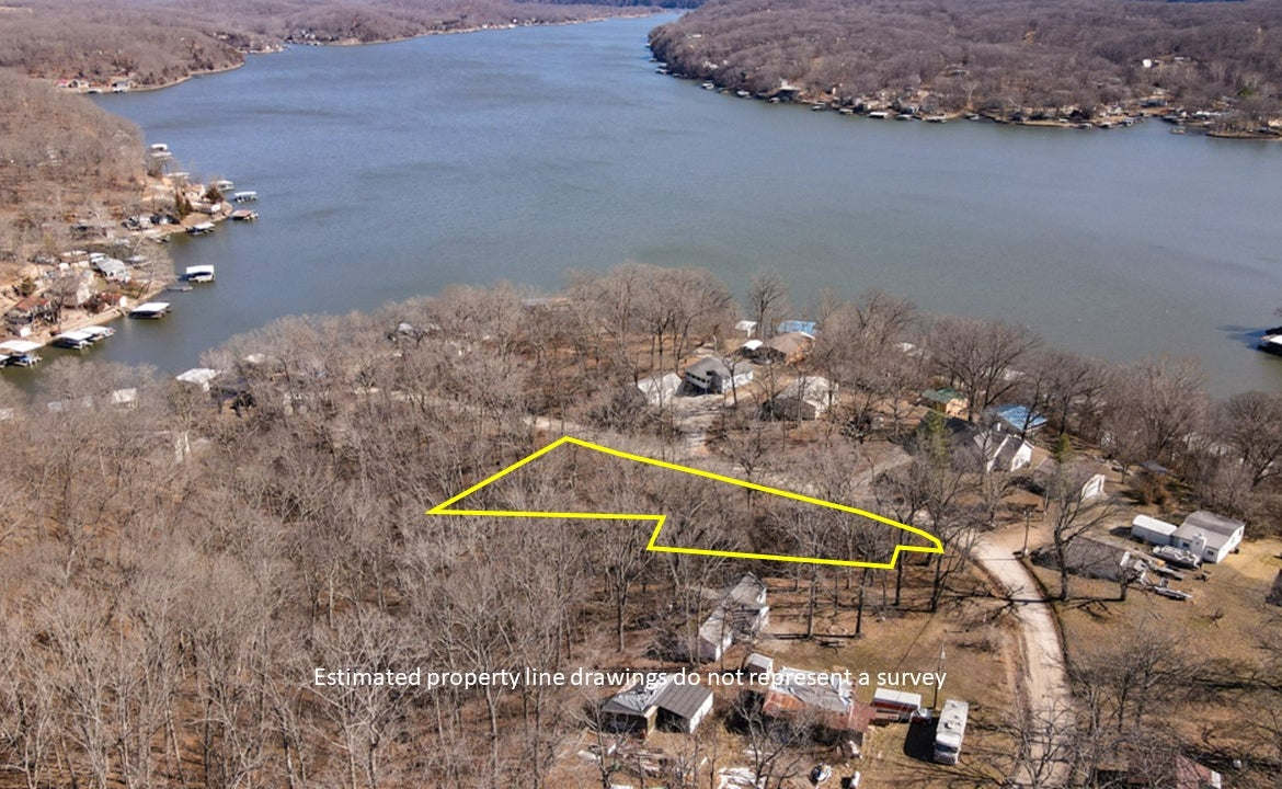 Treed Lot by the lake! 0.8 Acres